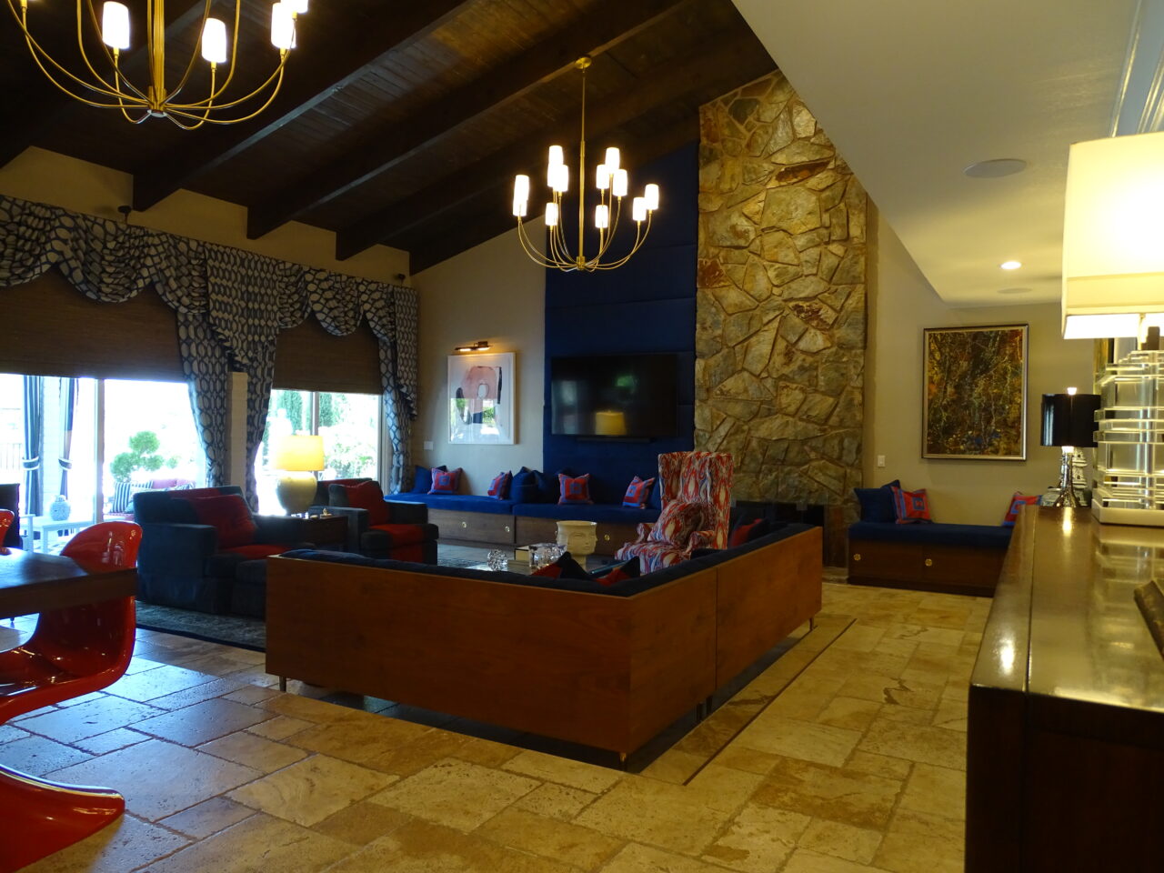 Elegant living room with modern decor and stone accents.