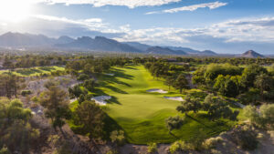 Scenic golf course with mountains in the background