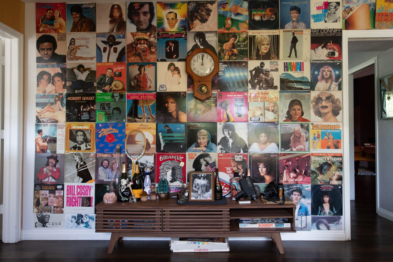 Wall covered with vintage vinyl record covers and memorabilia