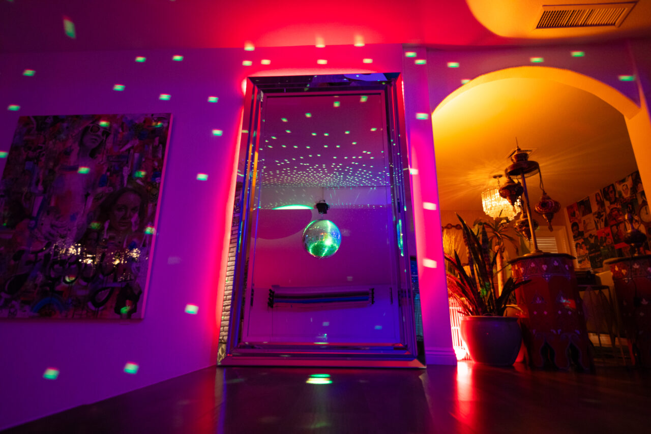 Vibrant disco ball lighting colorful hallway decor